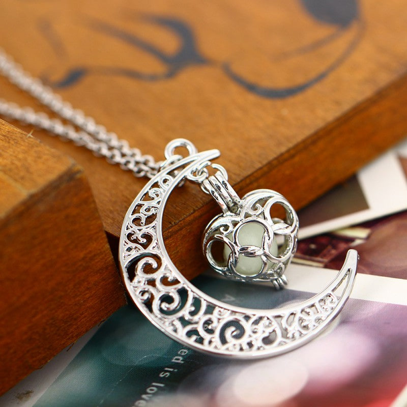 Glowing love pendant necklace close up of pendant